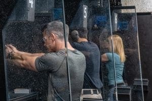 Three adults practicing Power Isosceles shooting discipline. Avoid Self-Defense Before It Starts.