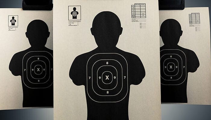Your Target Is Talking to You 3 a group of paper targets on a clip